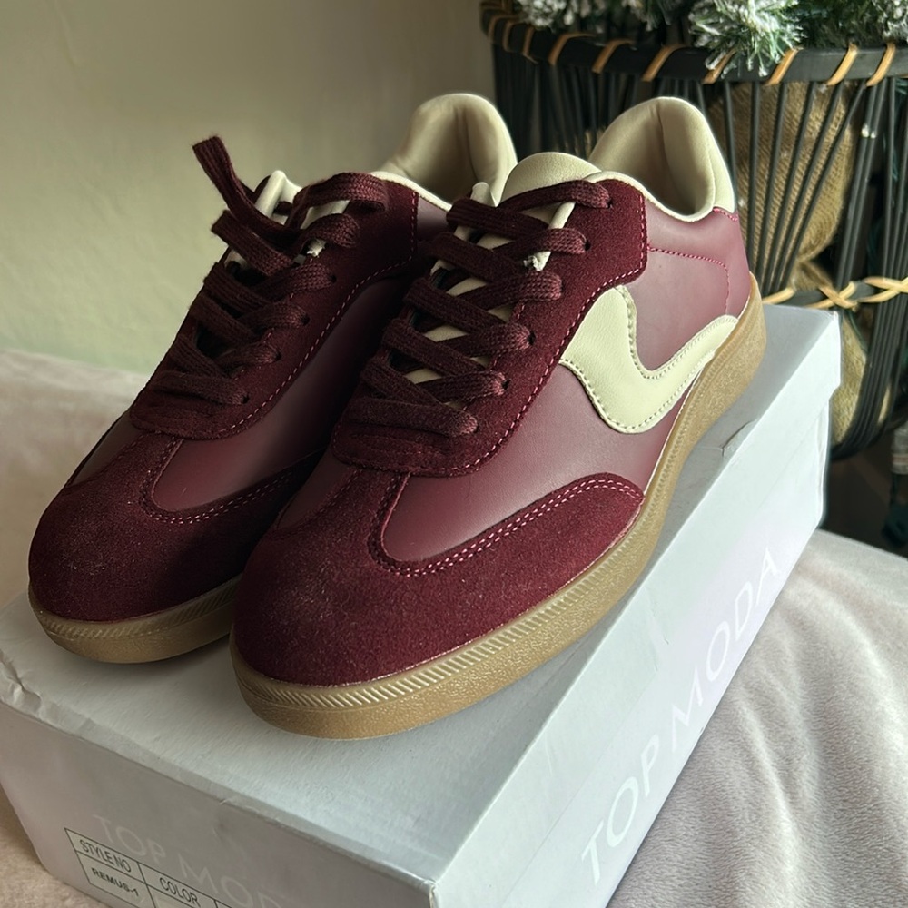 Woman’s brand new size 7 1/2 burgundy sneaker